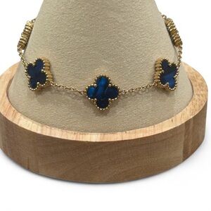 Elegant Gold and Blue Clover Bracelet